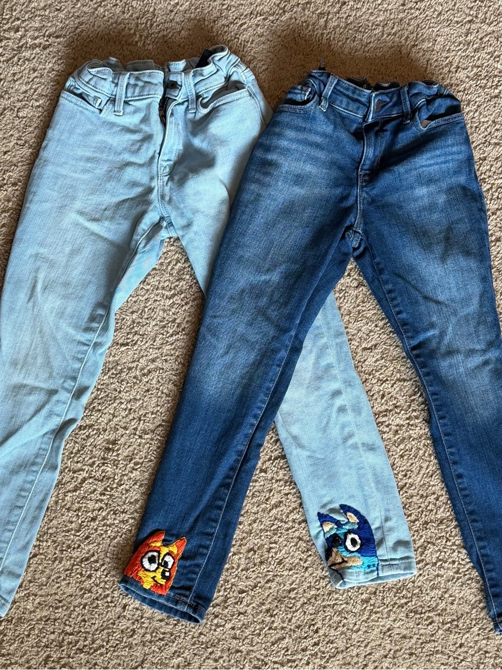 Girls size 7 supper skinny  light, dark wash  hand  Embroidered with bingo & Blu